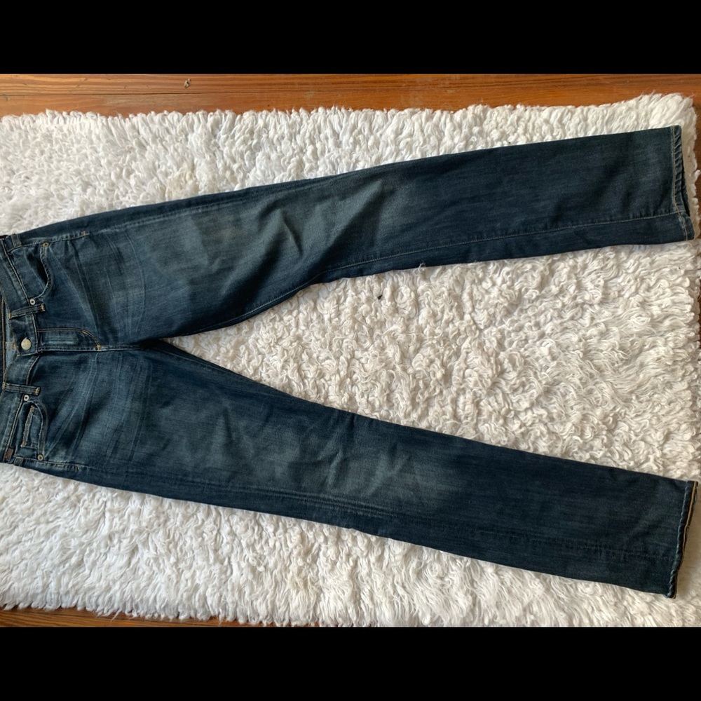 Dark washed blue jeans